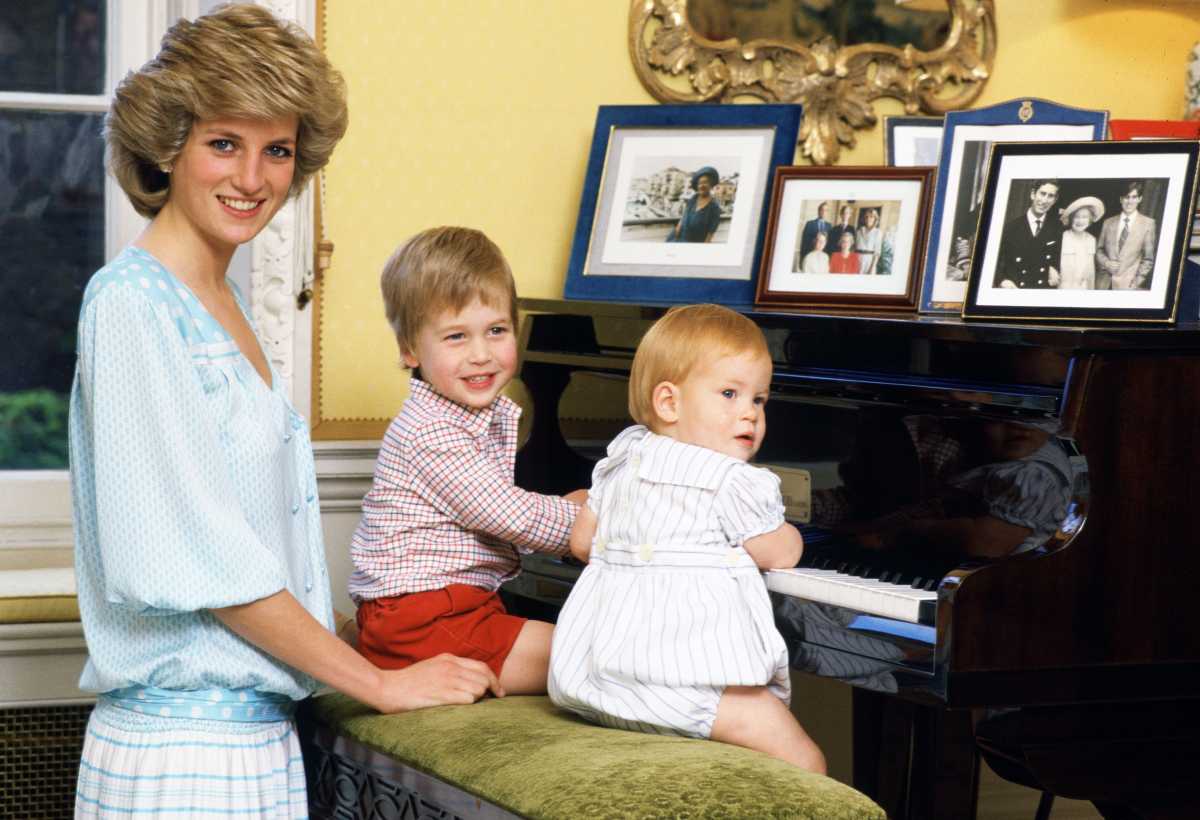 Diana, Princess of Wales, with her sons, Prince William and Prince Harry, at the piano in Kensington Palace. (Image Source: Getty Images | Tim Graham )