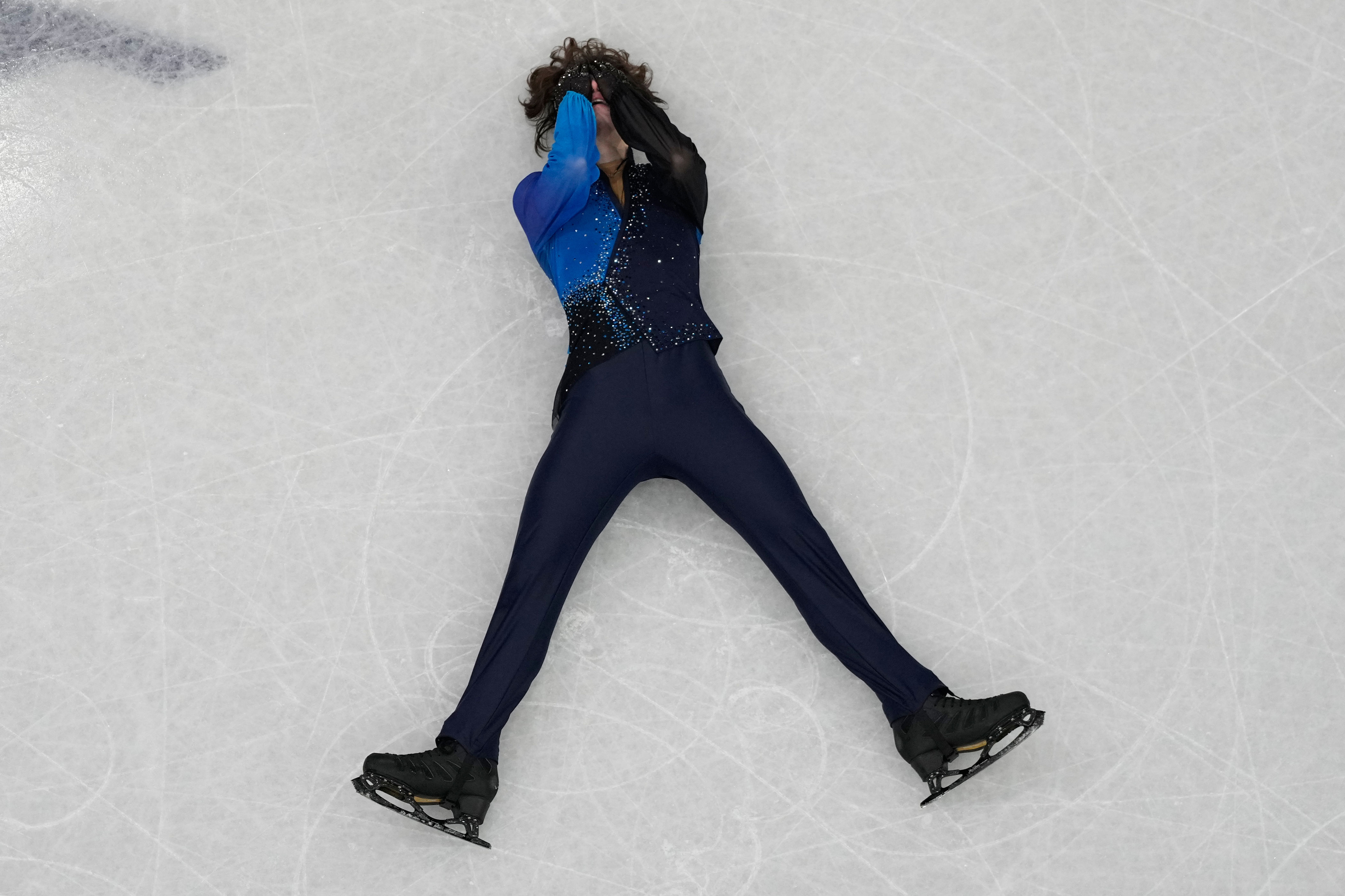 Mikhail Shaidorov earns gold in men's figure skating after collapse by 'Quad  God' Ilia Malinin