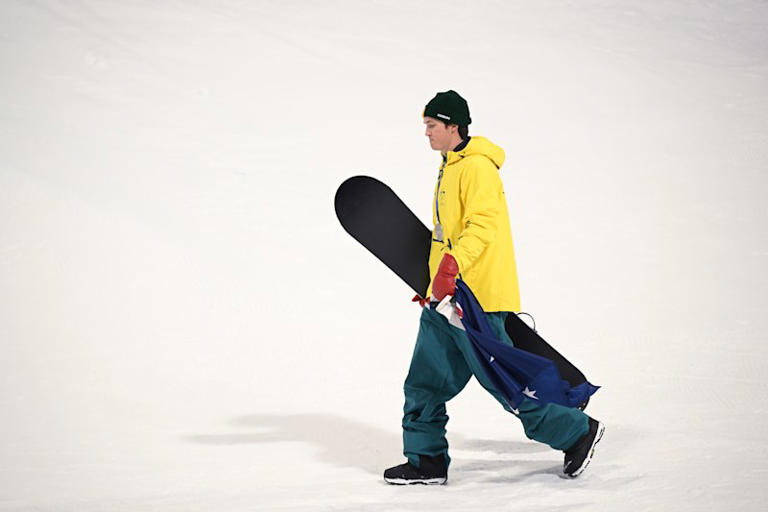 Scotty James leaves the medal ceremony.