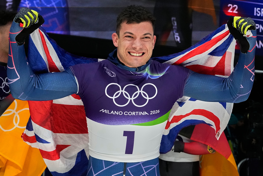 Weston gets his 1st Olympic skeleton gold medal, in race where Heraskevych was DQ