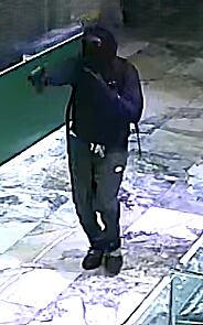 Las Vegas police search for suspects in armed robbery