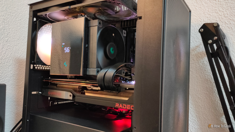 A gaming PC with five cooling fans and a CPU cooler.