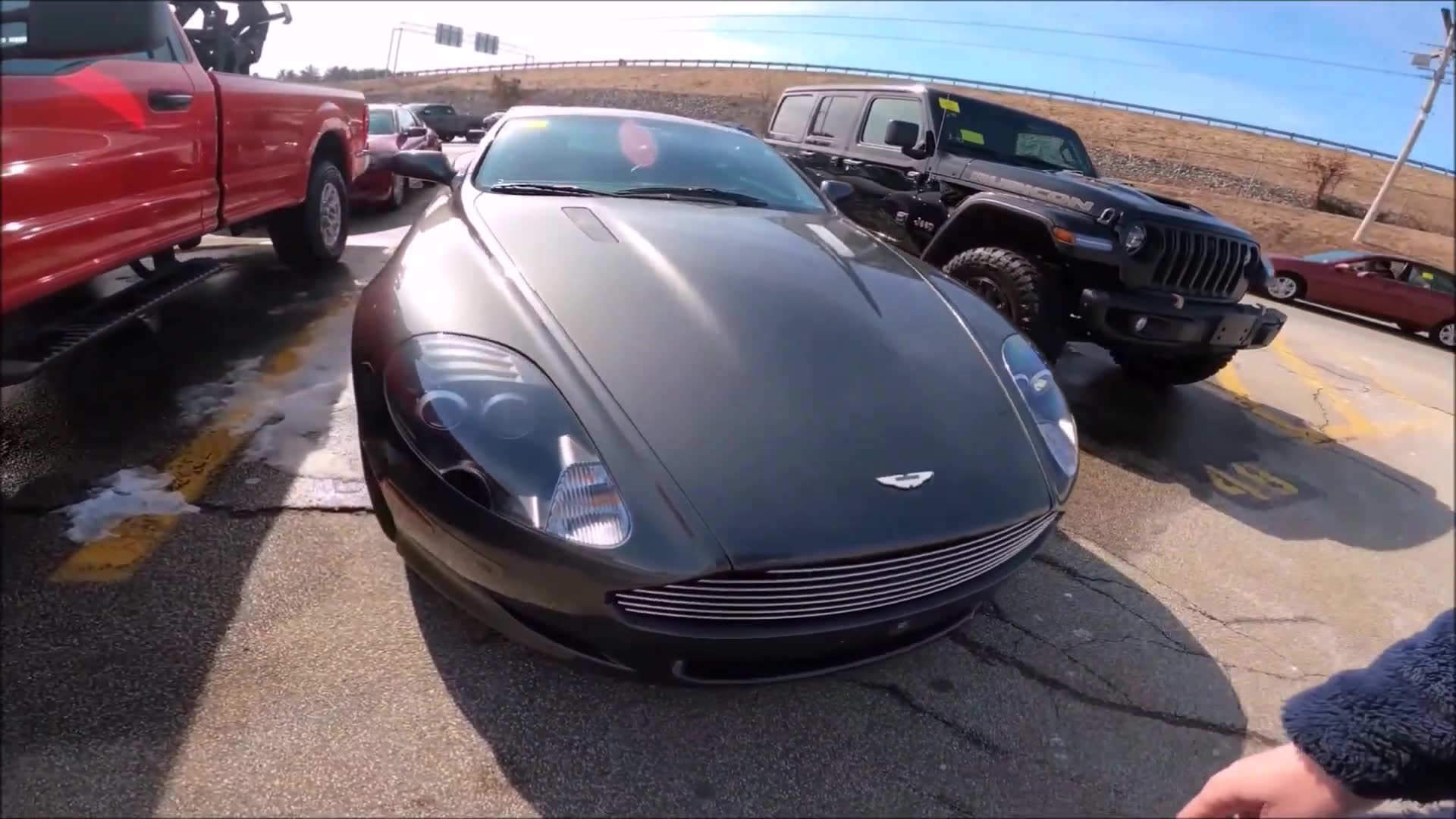 Spending $215,000 on an Aston Martin DB9 at dealer auction