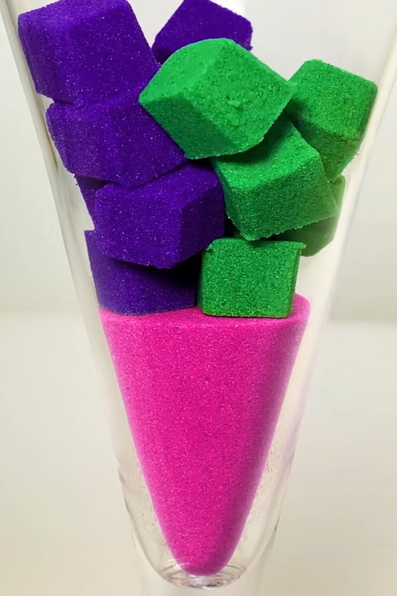 Stacked colorful kinetic sand cubes