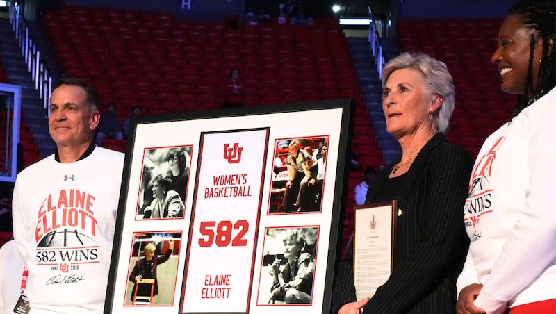 A banner honoring Elaine Elliott now hangs in the Huntsman Center ...