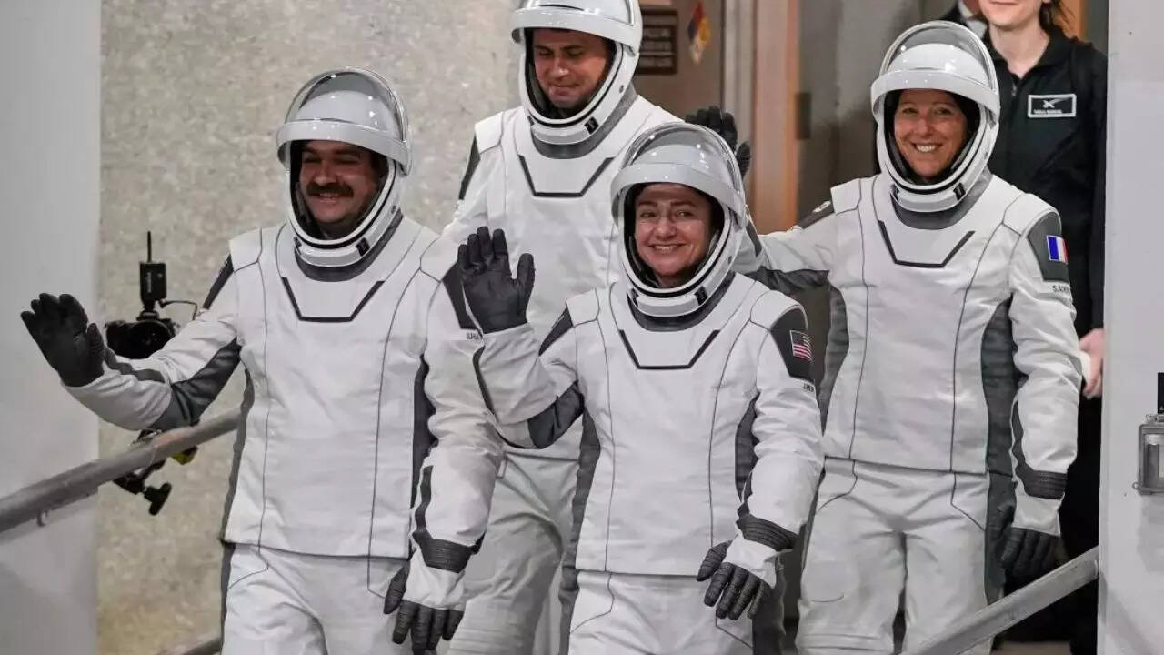 Four astronauts arrive at International Space Station via SpaceX to ...