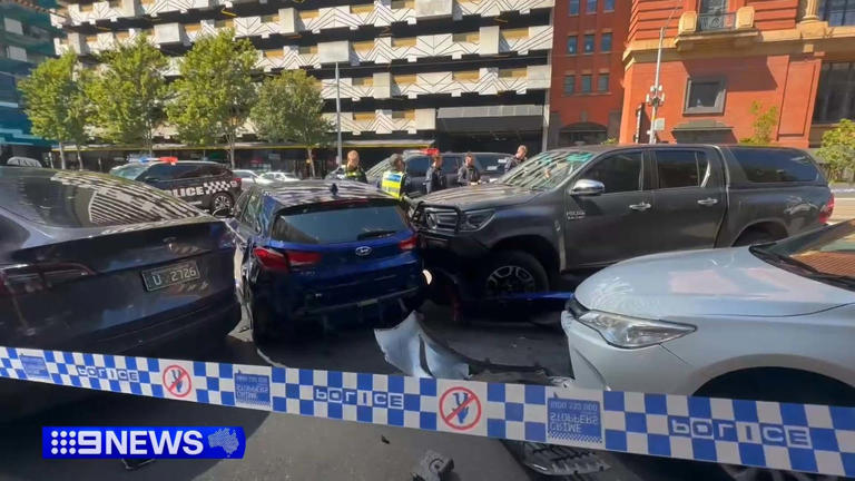 Undercover police have rammed a car in the middle of Melbourne after it was seen driving erratically.