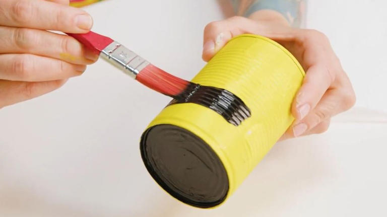 Turn empty soup cans into adorable garden decor you'll love