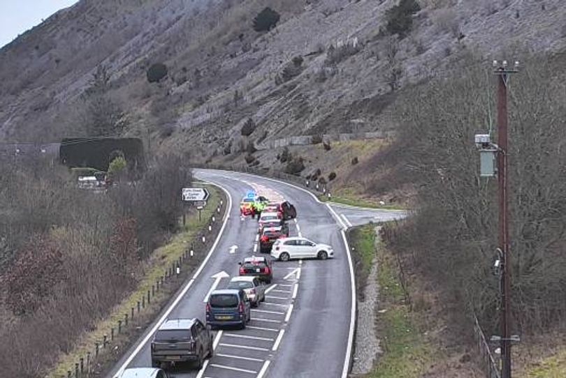 Two taken to hospital after crash which shut key route for hours
