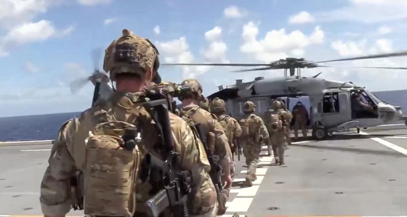 US says it interdicted and boarded vessel defying Trump