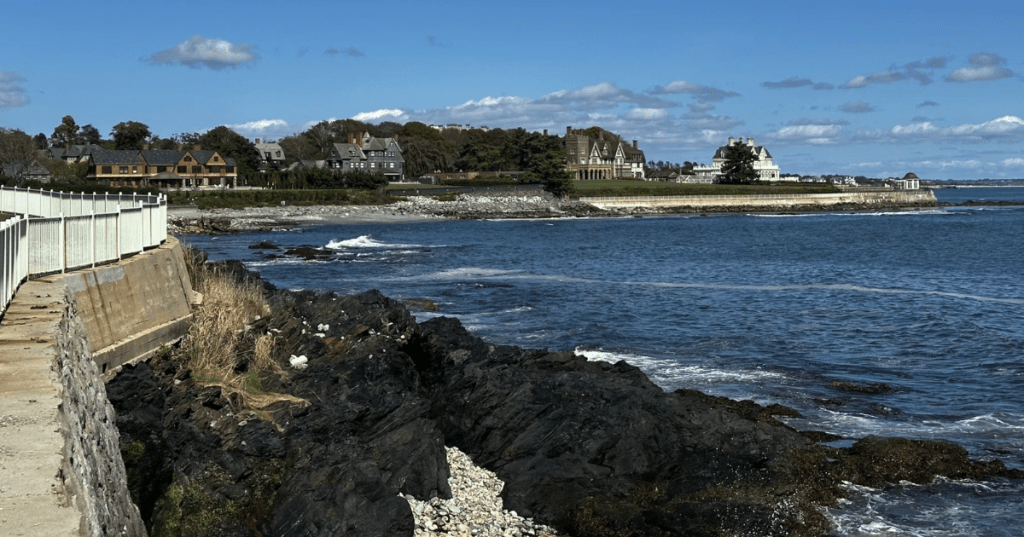 Coastal views of the Cliff Walk in Newport, RI, a scenic attraction near the Swiss-inspired Fairy House.
