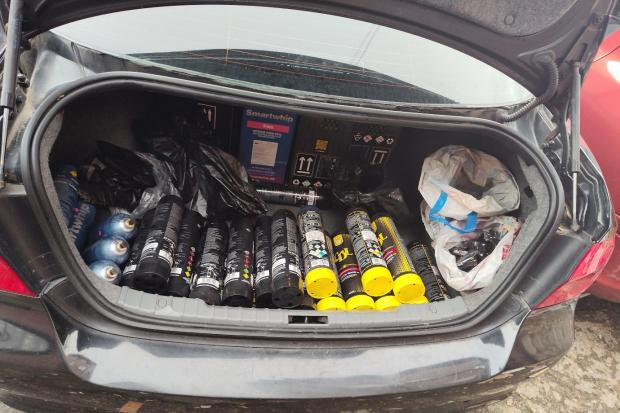 More than 50 drugs cans found in car after man tries to run from police