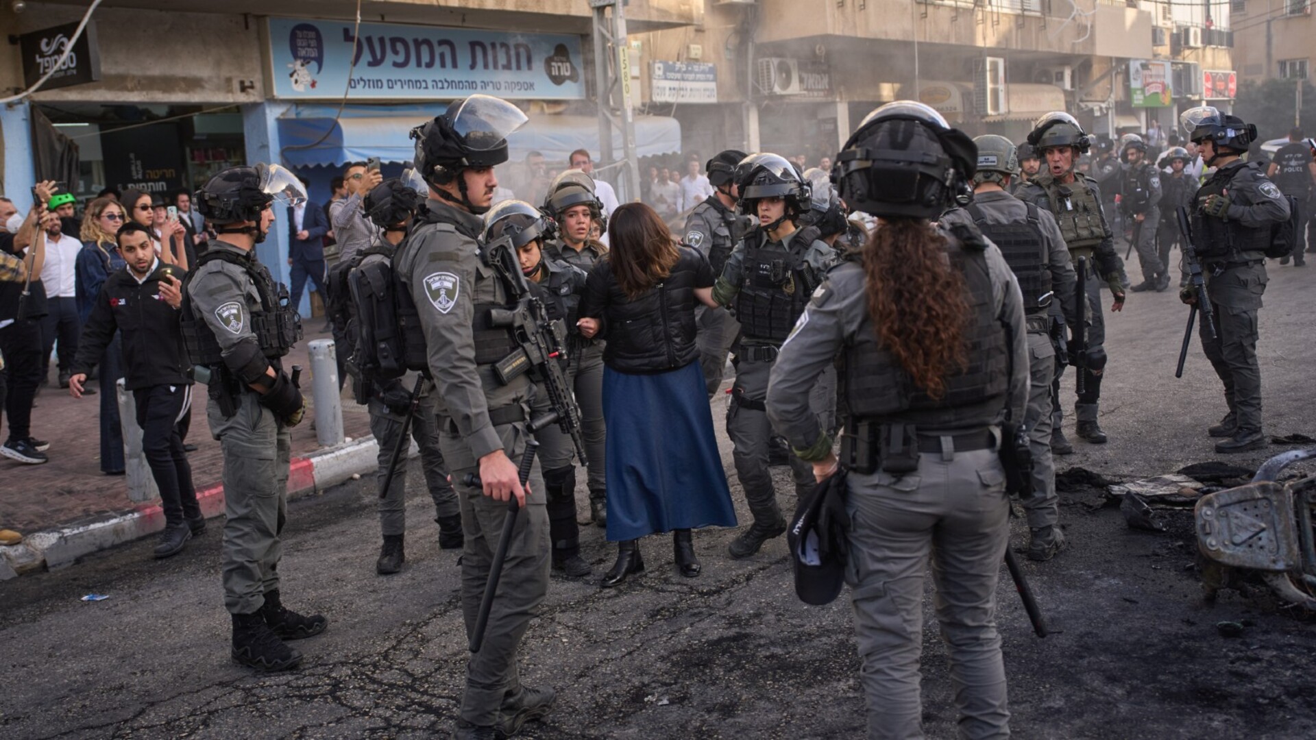 Over 20 people arrested and two female soldiers rescued following ...