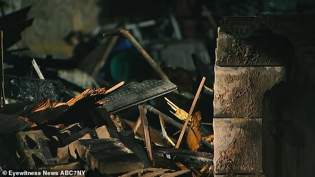 Newborn baby girl is found dead in rubble of apartment after fire ...