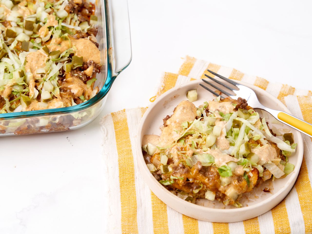 Big Mac casserole with cheese topped with lettuce