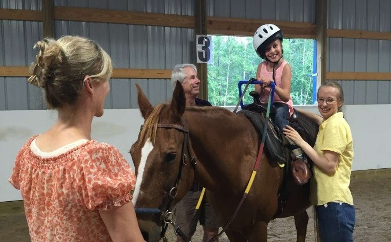 Tall in the saddle, Midland Kiwanis are in it together