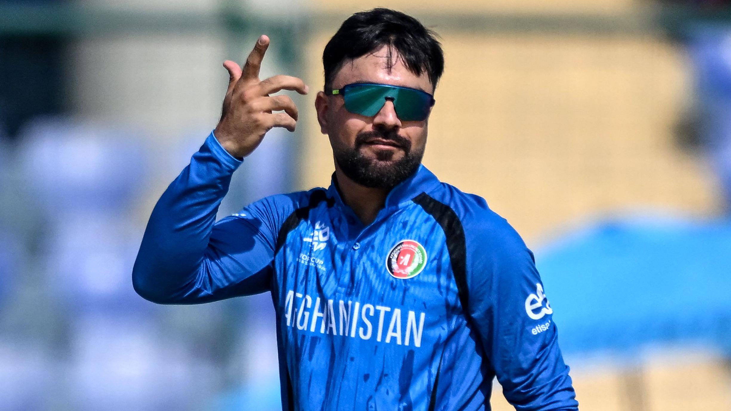 Rashid takes unusual 700th wicket as Afghanistan beat UAE