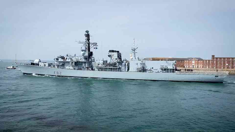 Two Royal Navy warships sail together