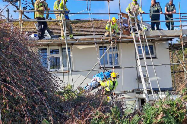 Workman airlifted to hospital after falling through storm‑damaged roof