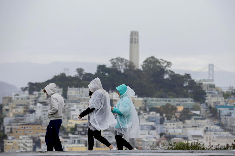 11 million under flood watch as storms bring heavy rain and snow to ...