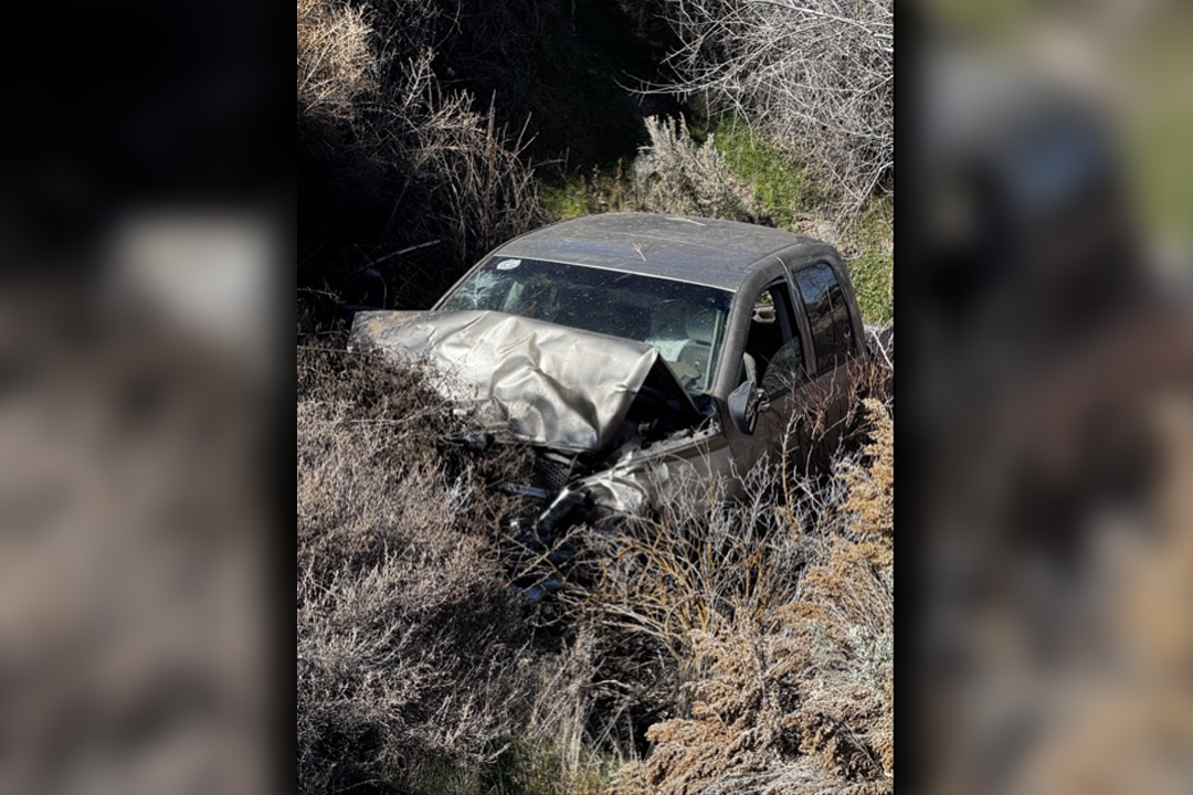 Driver hospitalized after pickup truck crashes on River Road