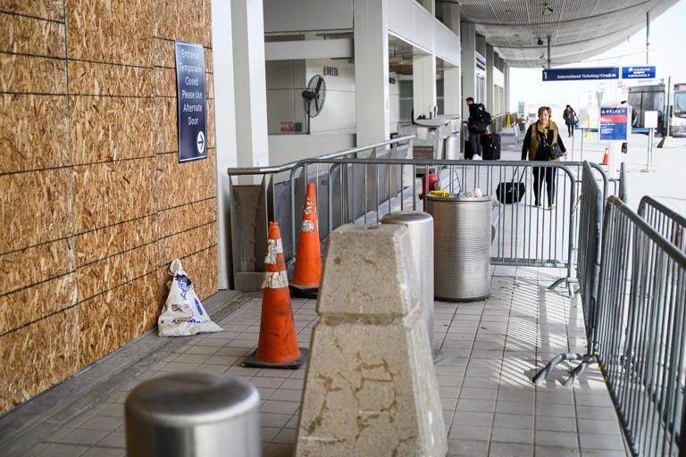 2 charged after separate Detroit Metro Airport crashes