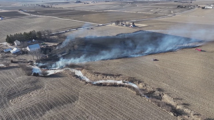 Crews put out large field fire in rural Scott County amid dry conditions