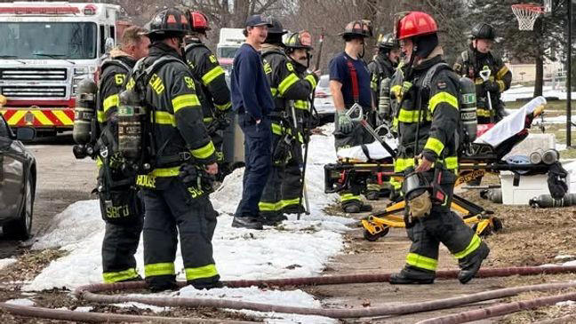 One person taken to hospital, dog rescued after South Bend house fire