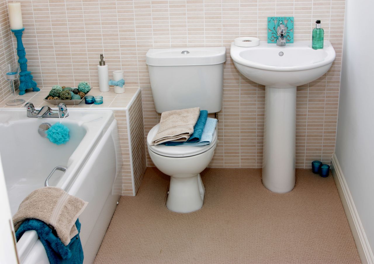 Modern bathroom with turquoise and beige accents