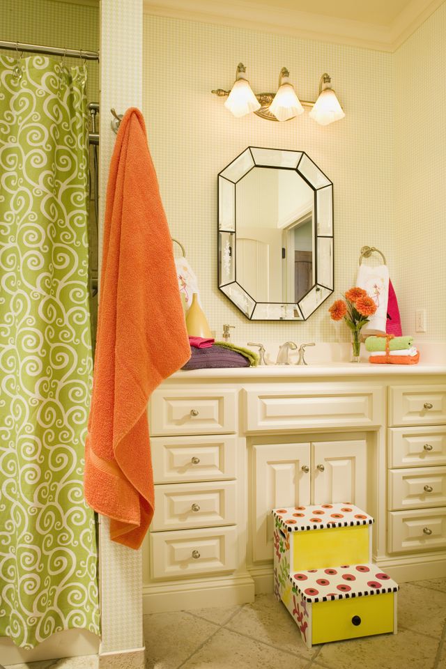 Child's Step Stool in Front of Bathroom Vanity