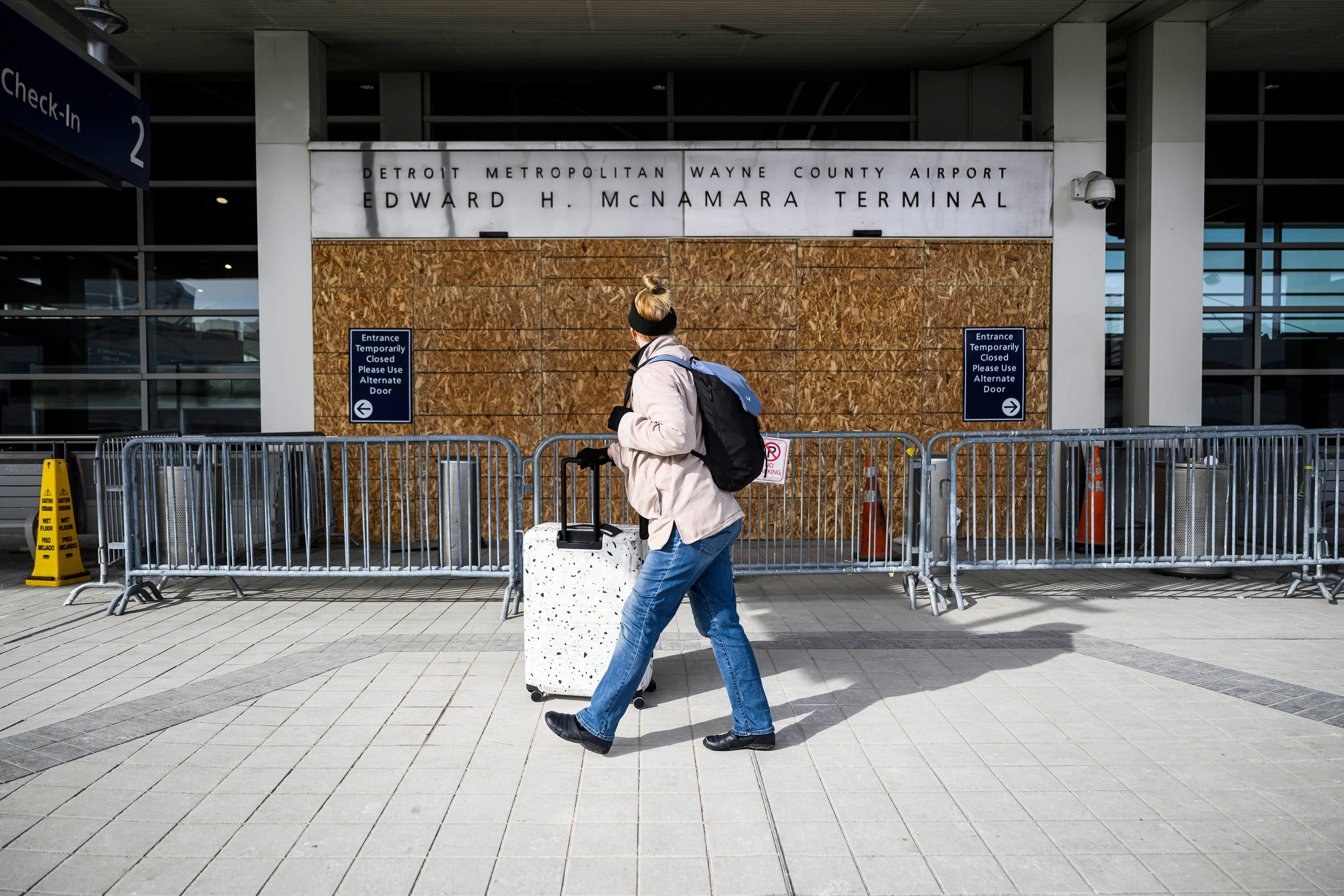 2 charged after separate Detroit Metro Airport crashes