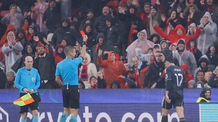 Raúl Asencio (right) was sent off last time out against Benfica. | Filipe Amorim/AFP/Getty Images