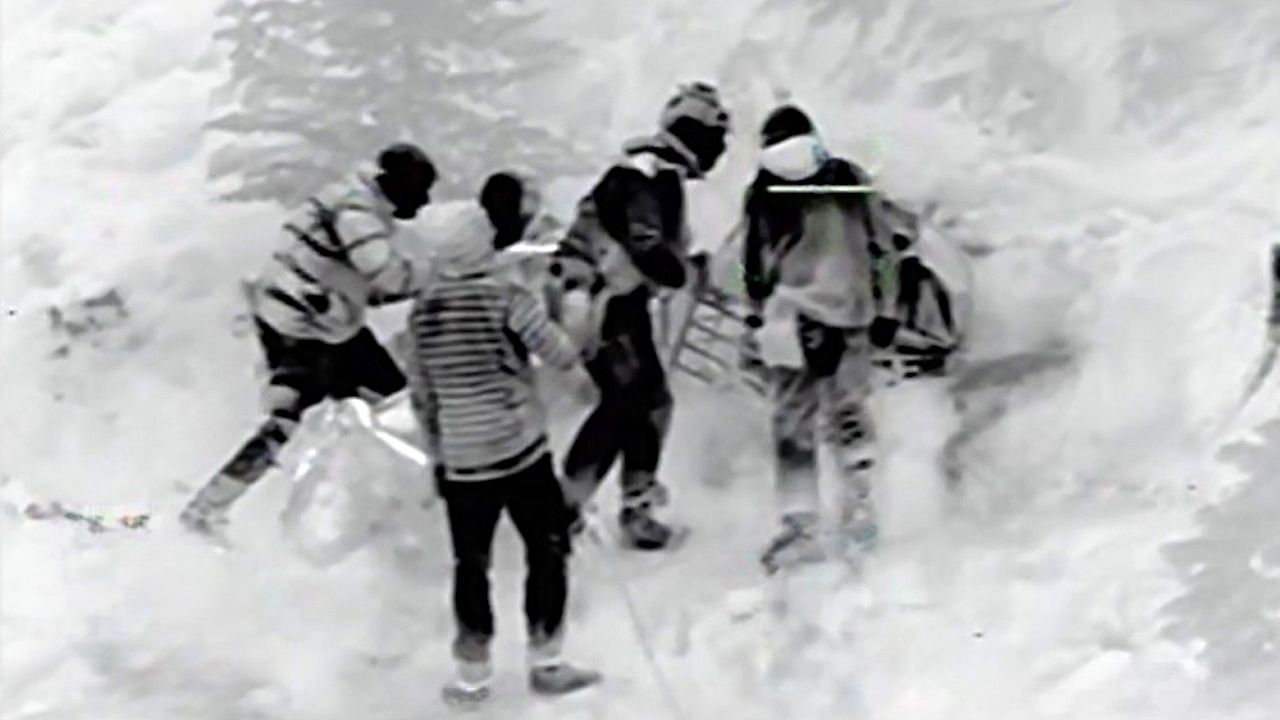 Perilous nighttime rescue after hikers fall down avalanche chute on ...