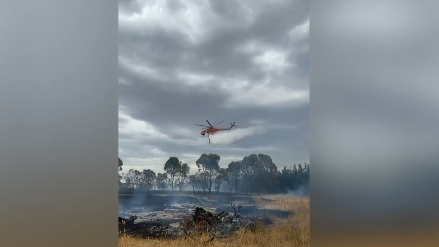 Bushfire in central Victoria downgraded after wind change pushes flames ...