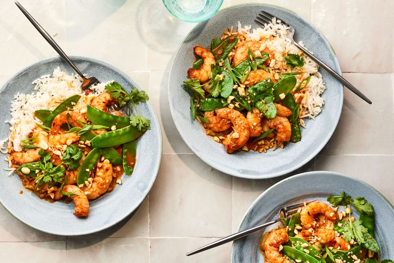Southern Living Cajun Shrimp Stir-Fry on plates ready to serve