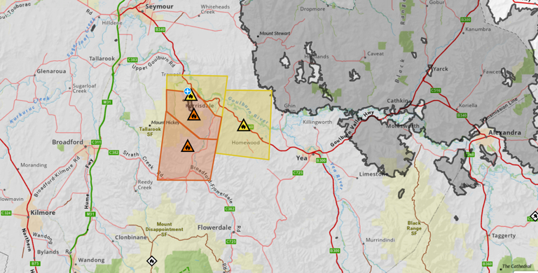 Bushfire in central Victoria downgraded after wind change pushes flames ...