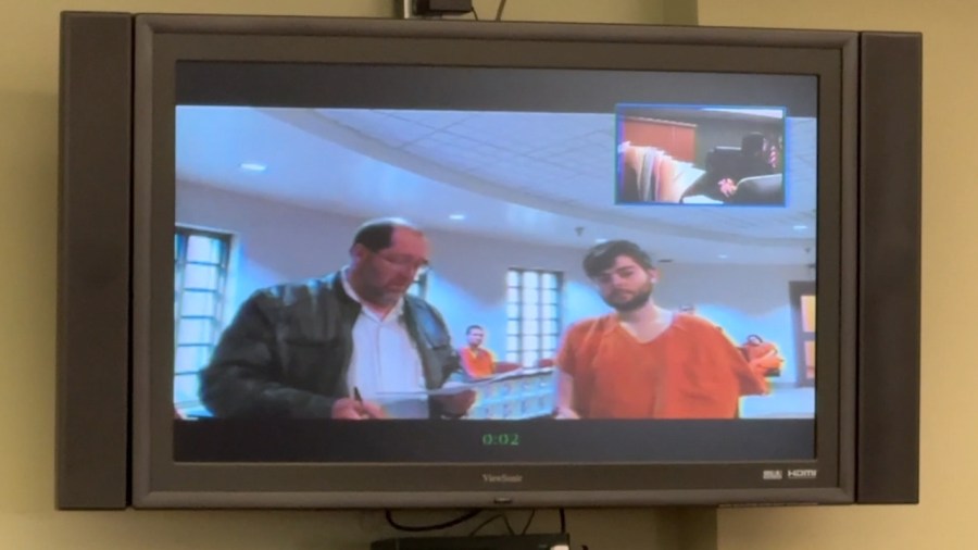 Man charged, officer on leave after Howland officer-involved shooting