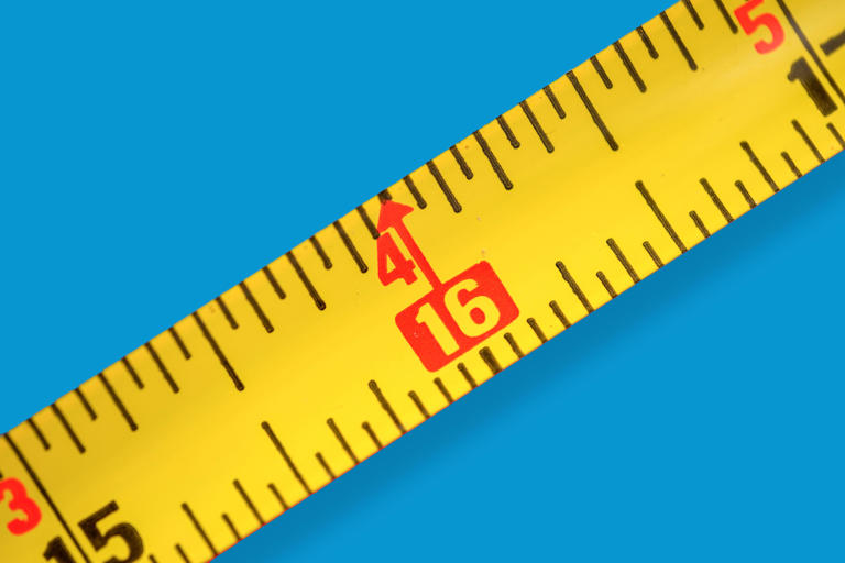 The hidden code behind your tape measure’s red squares