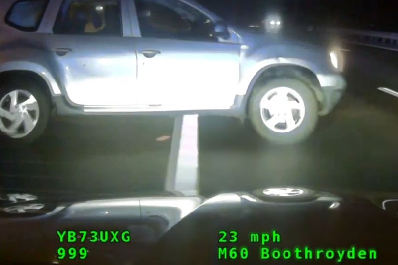 Driver going wrong way on M60 rammed by cop car in dramatic police chase