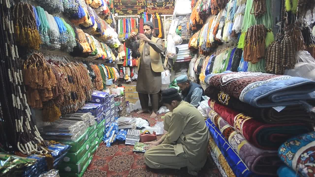 Vendors and shoppers prepare for the upcoming holy month of Ramadan in