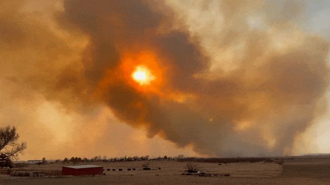Smoke shrouds sun in orange haze as wildfire rips through Texas Panhandle
