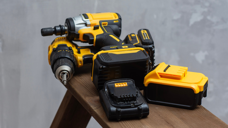 The storage rack that will keep tools organized and charged at the same ...