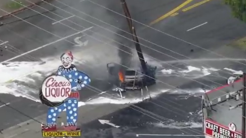 EV vehicle crashes into North Hollywood power pole, LAFD crews battle ...