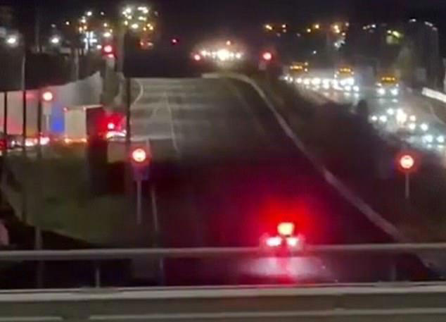 Wild moment speeding truck is 'chased' on wrong side of the road before ...