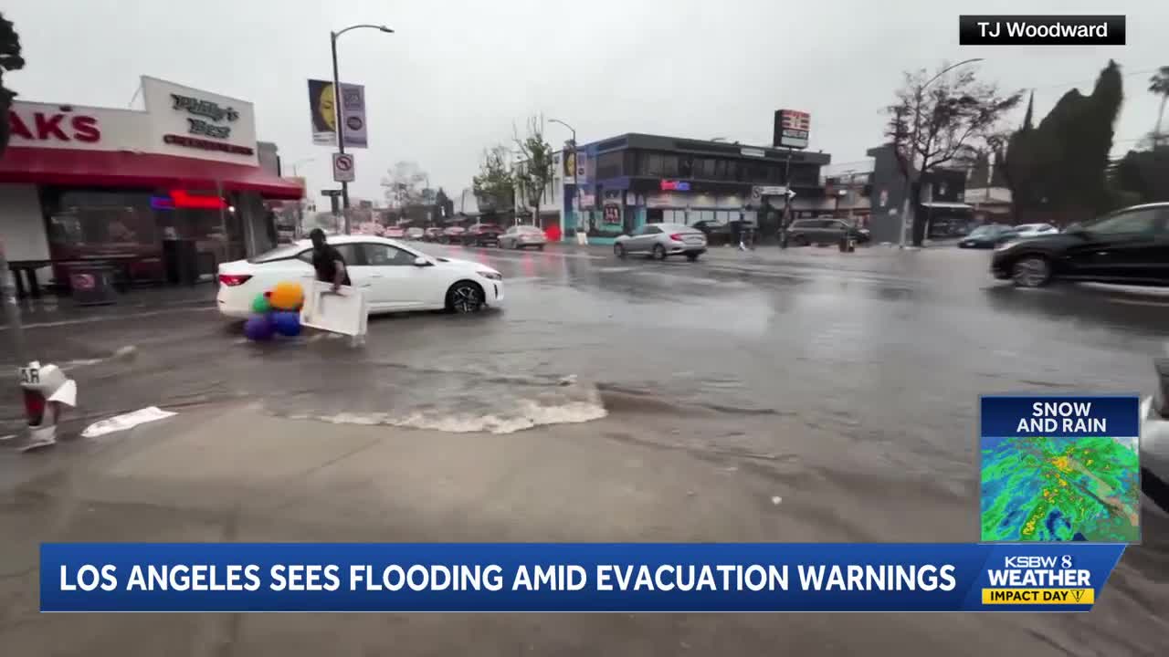 Heavy rain floods roads and vehicles in Los Angeles