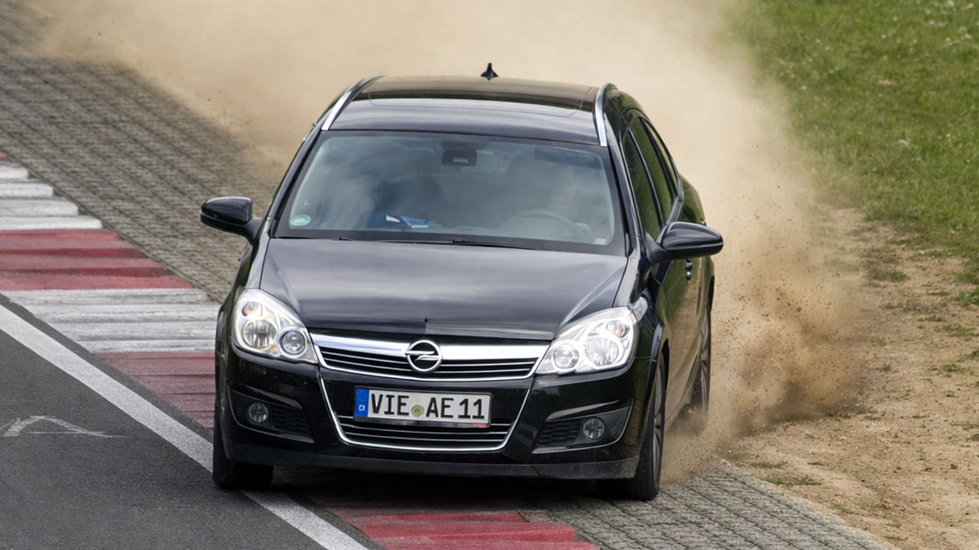 Slow car pushed hard, runs wide