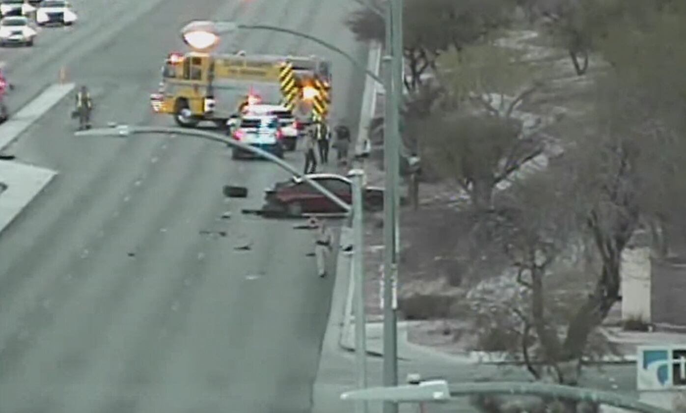 Car rolls over, hits light pole in west Las Vegas crash, police say