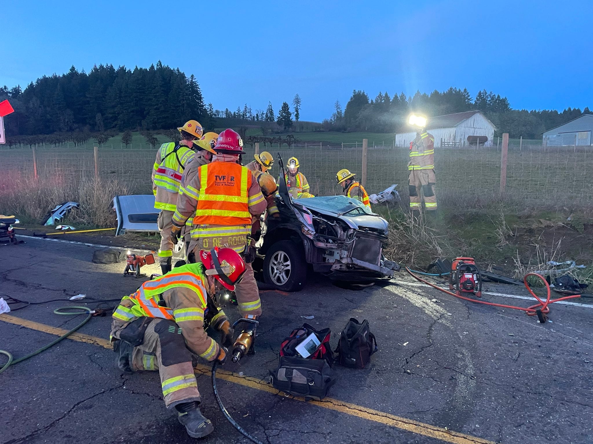 Crews rescue person trapped in car after crash near Newberg