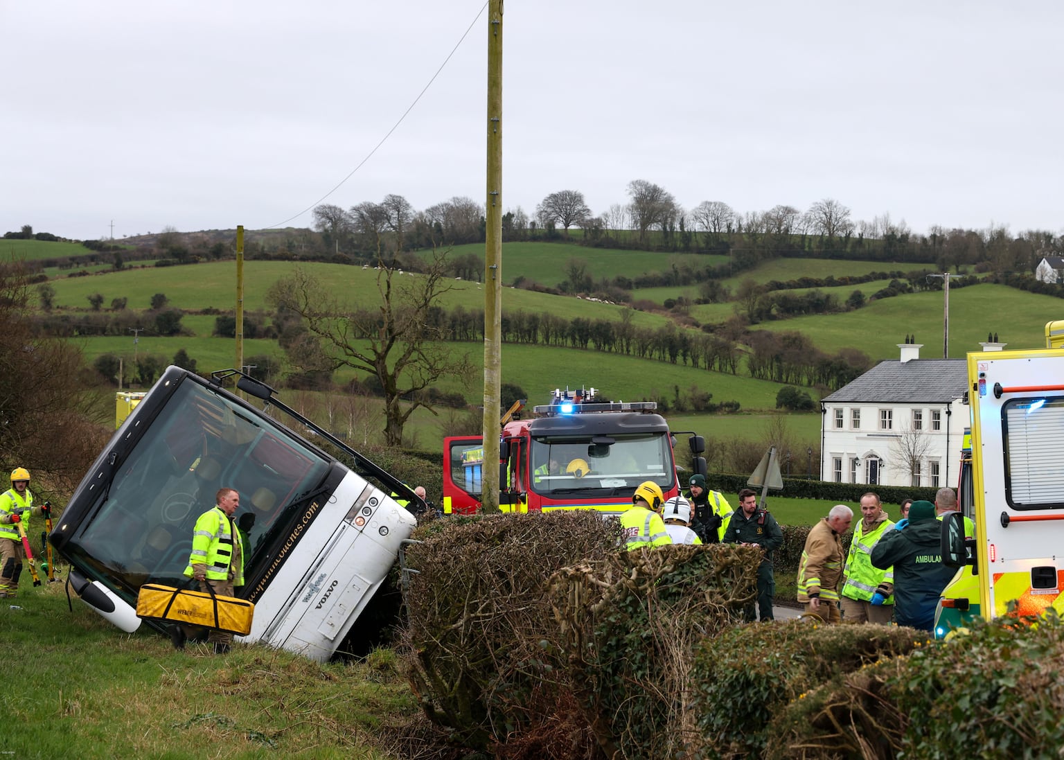 Driver dies after crash involving bus carrying schoolchildren