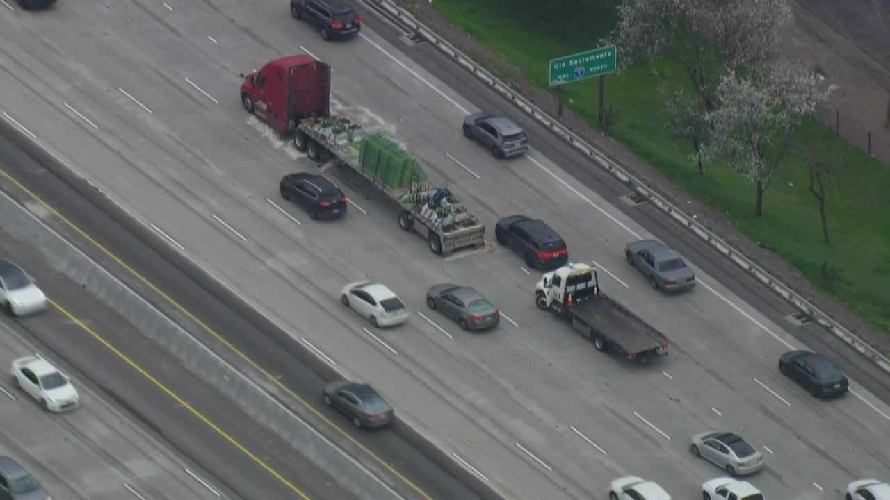 Big rig spills load, leaks oil on Highway 50, CHP says